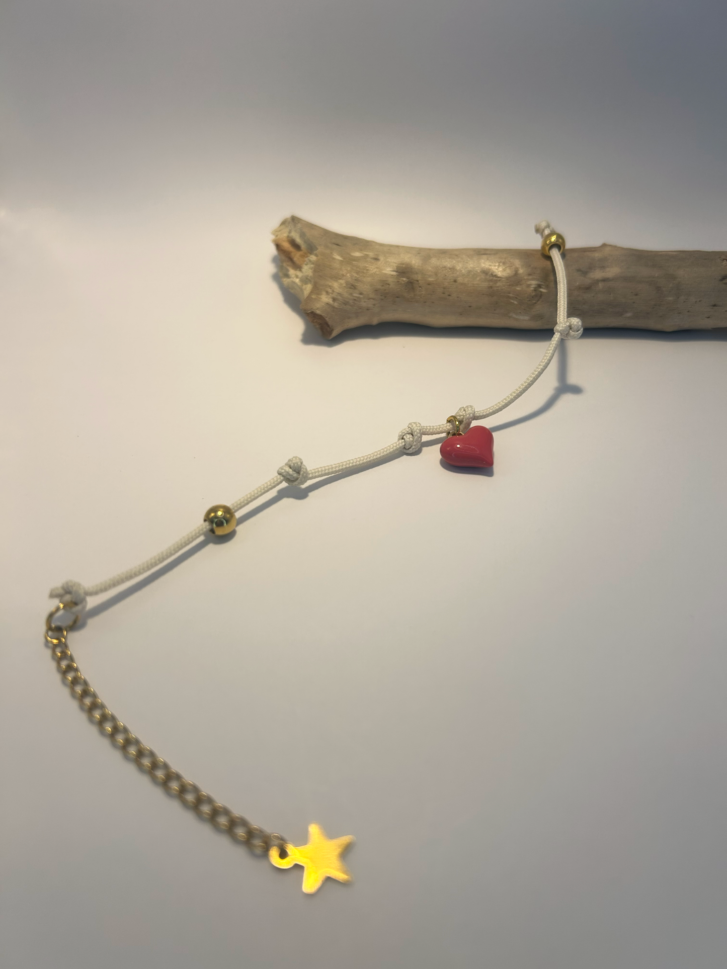 Bracelet cordon breloque coeur rose