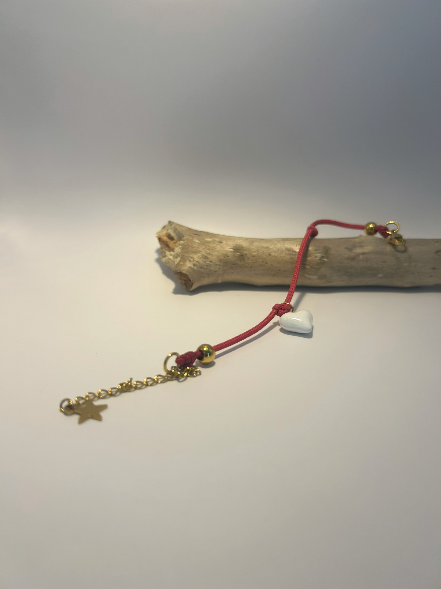 Bracelet cordon breloque coeur blanc
