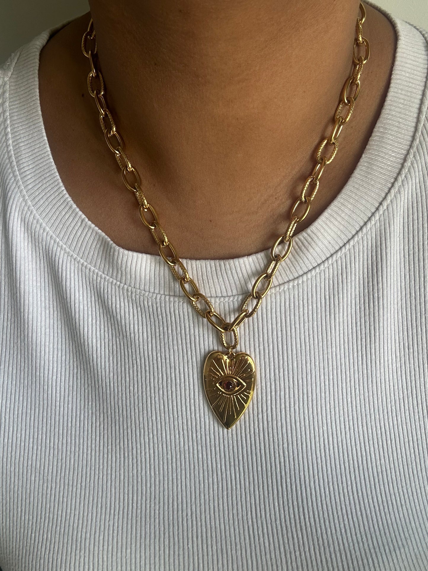Collier cœur œil