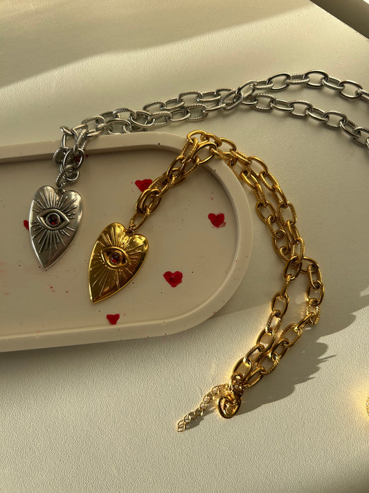 Collier cœur œil
